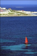 Sailboat in Salina Bay, off the northern coast of Malta, near the resort town of Bugibba