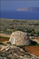 Rock walls and hut near the northwestern corner of Malta, built using the plentiful limestone