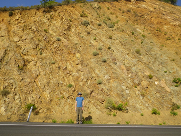 Josh standing by sheeted dikes in the Troodos ophiolite, Cyprus